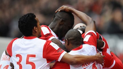 Les joueurs de Nancy savourent leur victoire (JEAN-CHRISTOPHE VERHAEGEN / AFP)