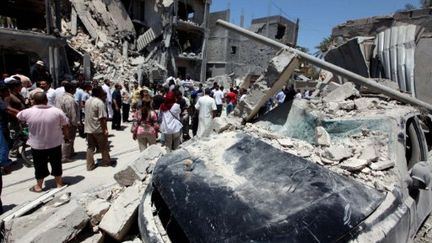 Après une bavure de l'OTAN sur un quartier de Tripoli (AFP - MAHMUD TURKIA)