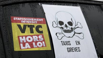 &nbsp; (Des associations de taxi dénoncent la concurrence du groupe américain Uber et appellent à journée d’action nationale le 26 janvier © Maxppp)