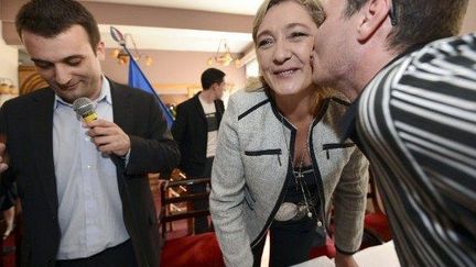 Marine Le Pen et Florian Philippot, porte-parole de la campagne (PATRICK HERTZOG / AFP)