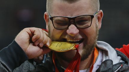 Pawel Fajdek, champion du monde du lancer de marteau, le 22 ao&ucirc;t 2015 &agrave; P&eacute;kin (Chine). ( DAMIR SAGOLJ / REUTERS)