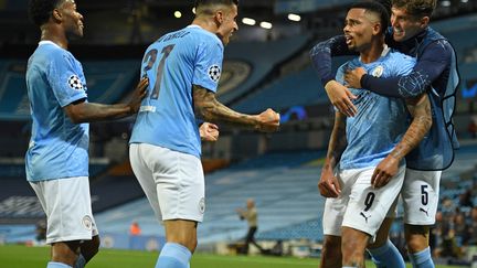 Suite à une nouvelle bourde de Varane, Gabriel Jesus en a profité pour permettre à Manchester City de filer tout droit en quarts de finale. (OLI SCARFF / POOL)