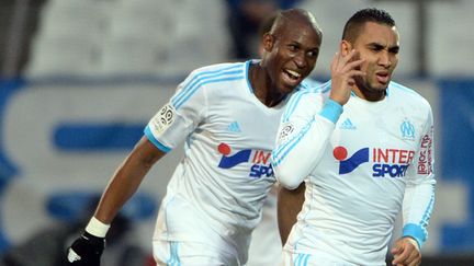 Dimitri Payet et Rod Fanni (ANNE-CHRISTINE POUJOULAT / AFP)