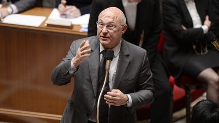 Michel Sapin, le ministre du Travail, le 26 f&eacute;vrier 2014 &agrave; l'Assembl&eacute;e nationale &agrave; Paris. (MARTIN BUREAU / AFP)