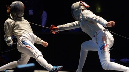 La Française Cecilia Berder face à la Russe Dina Galiakbarova (PATRICK HERTZOG / AFP)