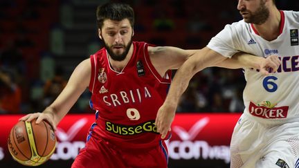 Le Serbe Stefan Markovic prend le meilleur sur le Fran&ccedil;ais Antoine Diot, le 12 septembre 2014 &agrave; Madrid (Espagne). (JAVIER SORIANO / AFP)