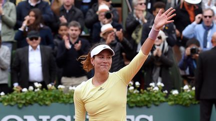 Garbine Muguruza célèbre sa victoire en finale de Roland-Garros, à Paris, le 4 juin 2016. (MIGUEL MEDINA / AFP)