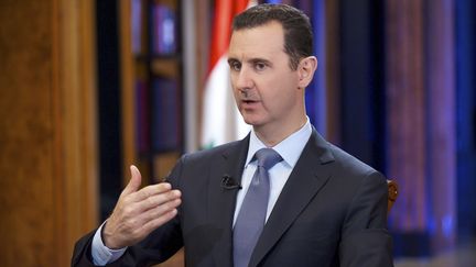 Le pr&eacute;sident syrien Bachar Al-Assad lors d'une interview &agrave; la cha&icirc;ne Fox News &agrave; Damas, en Syrie, le 18 septembre 2013. &nbsp; ( REUTERS)