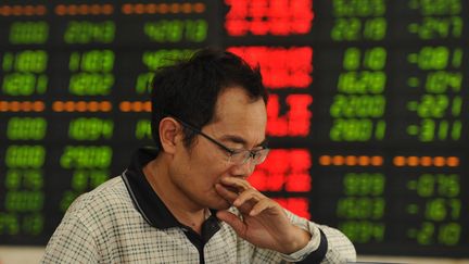 &nbsp; (Après trois semaines de baisse, la bourse chinoise accusait ce lundi matin une nouvelle chute de plus de 8% © MaxPPP)