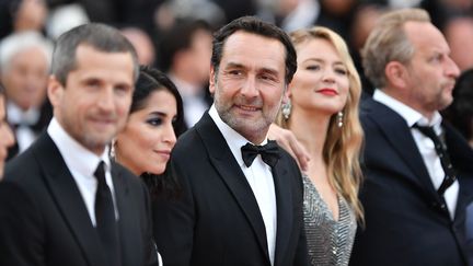 Gilles Lellouche et les acteurs du "Grand Bain" montent les marches du palais des Festivals à Cannes (Alpes-Maritimes), le 13 mai 2018. (MUSTAFA YALCIN / ANADOLU AGENCY)