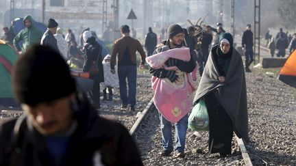 (En Grèce, à Idomeni, près de la frontière avec la Macédoine, le nombre de migrants a doublé en quelques jours © Reuters /Marko Djurica)