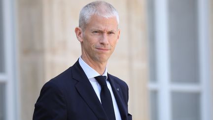 Le ministre de la Culture, Franck Riester, à la sortie du palais de l'Elysée, le 24 juillet 2019 à Paris.&nbsp; (LUDOVIC MARIN / AFP)