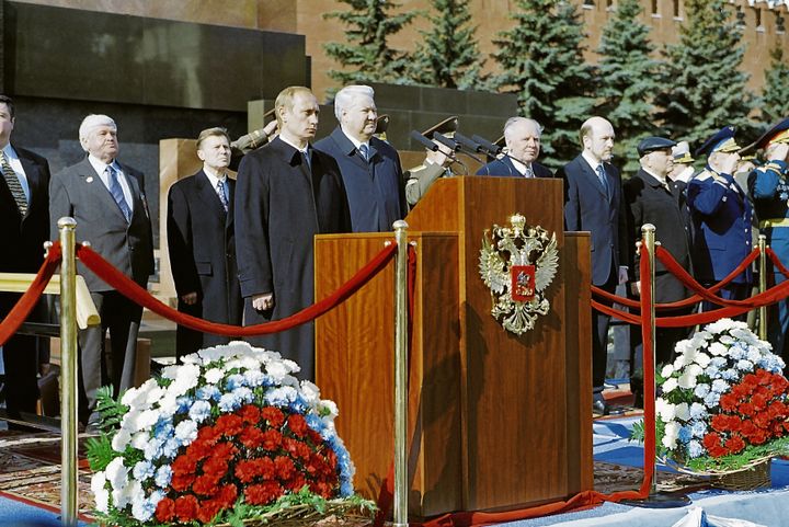 Russian President Vladimir Putin and his predecessor Boris Yeltsin during Victory Day commemorations May 9, 2000 in Moscow, Russia.   (VLADIMIR VYATKIN / SPUTNIK / AFP)