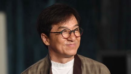 La star Jackie Chan lors du lancement de son nouveau film "Project X" lors du festival du film international de Shanghai, le 19 juin 2018. (CAO JI / IMAGINECHINA / AFP)