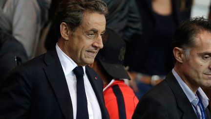 Nicolas Sarkozy au Parc des Princes, le 21 septembre 2014. (KENZO TRIBOUILLARD / AFP)