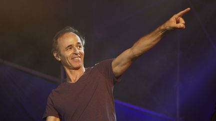 Jean-Jacques Goldman participe à un concert au profit des Restos du cœur, le 20 juillet 2014, à Ouveillan (Aude). (GAILLARD NICOLAS/APERCU/SIPA)