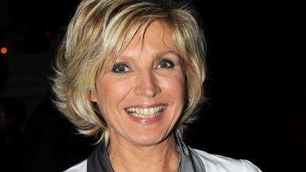 Evelyne Dh&eacute;liat (TF1) a re&ccedil;u le "G&eacute;rard de la pr&eacute;sentatrice m&eacute;t&eacute;o qui, au rythme du r&eacute;chauffement climatique, s'ass&egrave;che doucement mais s&ucirc;rement".&nbsp; (BENAROCH / SIPA)