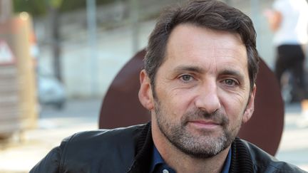 L'artiste français&nbsp;Xavier Veilhan lors de l'inauguration du centre commercial Beaugrenelle en 2015 à Paris. (ERIC PIERMONT / AFP)