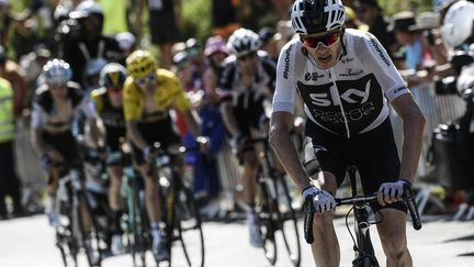 Le Britannique Christopher Froome&nbsp;dans les derniers kilomètres, de la 12e étape du 105e Tour de France, entre Bourg-Saint-Maurice et l'Alpe d'Huez, le 19 juillet 2018. (PHILIPPE LOPEZ / AFP)