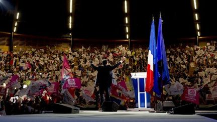 François Hollande a tenu un meeting à Limoges en présence d'Eva Joly. (FRED DUFOUR / AFP)