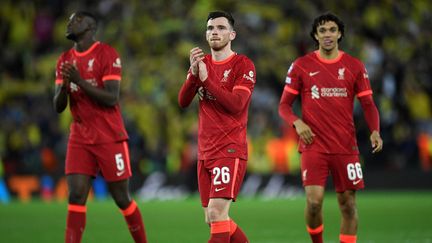 Les joueurs de Liverpool célèbrent leur victoire face à Villarreal en demi-finale aller de Ligue des champions, à Anfield, le 27 avril 2022. (OLI SCARFF / AFP)