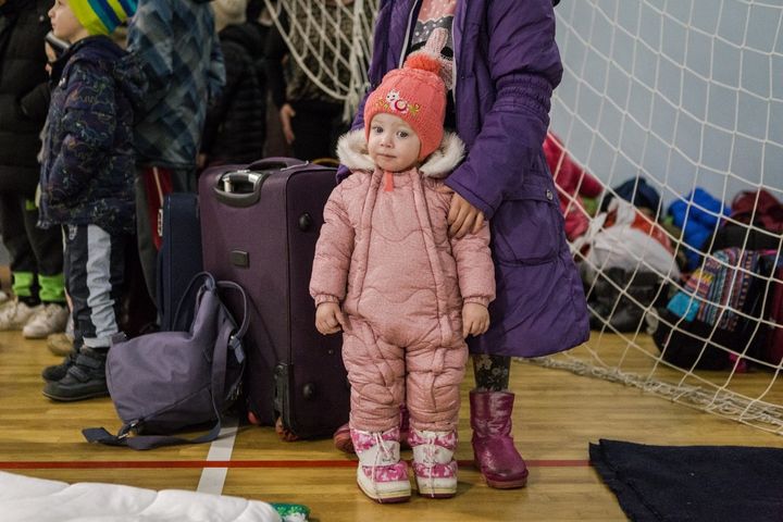 March 4, 2022 in Dnipro. Civilians from Kharkiv settle in a refugee center on the 9th day of the large-scale Russian attacks in Ukraine.  (ANDREA CARRUBBA / ANADOLU AGENCY VIA AFP)