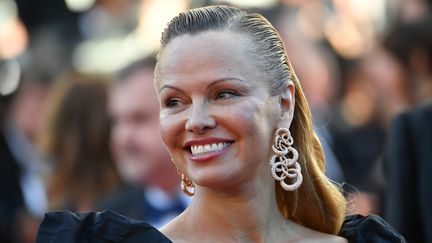 La star d'"Alerte à Malibu" Pamela Anderson a aussi monté les marches du Palais des festivals.
 (Loïc Venance / AFP)