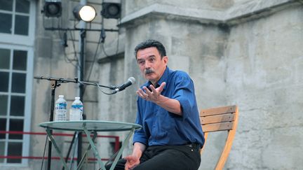 Le journaliste Edwy Plenel, fondateur de Mediapart, lors d'une conférence au festival Les Suds à Arles (Bouches-du-Rhône), le 8 juillet 2019. (SANDRA FASTRE / HANS LUCAS / AFP)