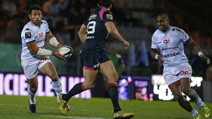 Les Racingmen Laulala et Rokococko face au Stadiste Doumeyrou (THOMAS SAMSON / AFP)