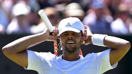 Le soulagement de Jo-Wilfried Tsonga après sa victoire face à Muller. (GLYN KIRK / AFP)