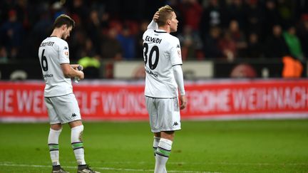 Les joueurs de Moenchengladbach (PATRIK STOLLARZ / AFP)