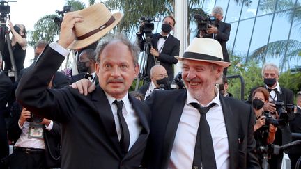 Denis Podalydes et Arnaud Desplechin à Cannes (VALERY HACHE / AFP)