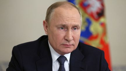 Le président russe Vladimir Poutine lors d'une conférence téléphonique à Moscou le 22 juin 2022. (MIKHAIL METZEL / SPUTNIK / AFP)