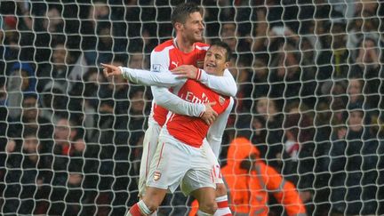 Olivier Giroud et Alexis Sanchez (Arsenal) (GLYN KIRK / AFP)