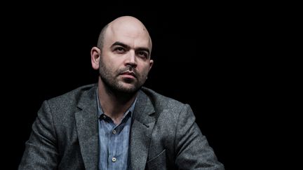 L'auteur italien Roberto Saviano, en mars 2019 à Lyon. (JEFF PACHOUD / AFP)