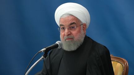 Le président iranien Hassan Rohani lors d'une prise de parole commune avec le ministre des Affaires étrangères iranien&nbsp;Mohammad Javad Zarif, à Tokyo (Japon) le 20 décembre 2019. (IRANIAN PRESIDENCY / HANDOUT / ANADOLU AGENCY / AFP)