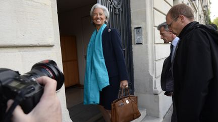 L'ex-ministre de l'Economie Christine Lagarde arrive &agrave; la Cour de Justice de la R&eacute;publique, le 19 mars 2014 &agrave; Paris, pour une confrontation dans le cadre de l'affaire Tapie. (LIONEL BONAVENTURE / AFP)