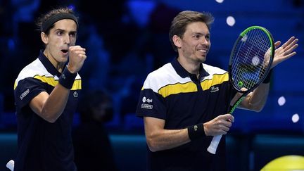 Pierre-Hugues Herbert et&nbsp;Nicolas Mahut se sont qualifiés pour les finale du Masters ATP, vendredi 19 novembre, à Turin.&nbsp; (MARCO BERTORELLO / AFP)