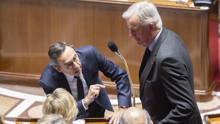 Bruno Retailleau et Michel Barnier à l'Assemblée nationale, le 19 novembre 2024. (VINCENT ISORE / MAXPPP)