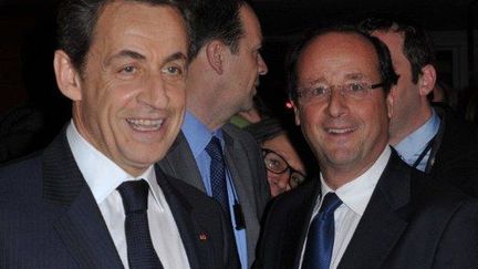 Nicolas Sarkozy et François Hollande (au dîner du Crif, 8 février 2012) (PHOTO POOL / CHRISTOPHE GUIBBAUD)