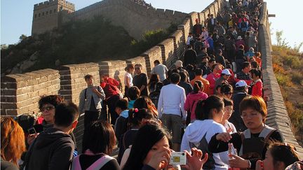 le plus célèbre tronçon restauré de la Grande Muraille, pris d’assaut lors de la semaine de vacances accordée à l’occasion de la fête nationale, début octobre.
 
 
 
 
 ( Yann Layma)