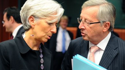 La directrice g&eacute;n&eacute;rale du FMI Christine Lagarde et le pr&eacute;sident de l'Eurogroupe Jean-Claude Juncker &agrave; Bruxelles (Belgique), le 14 juin 2011. (GEORGES GOBET / AFP)