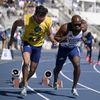 Trésor Makunda et son guide Lucas Mathonat lors des championnats du monde de para-athlétisme, le 11 juillet 2024, au stade Charléty de Paris. (AFP)