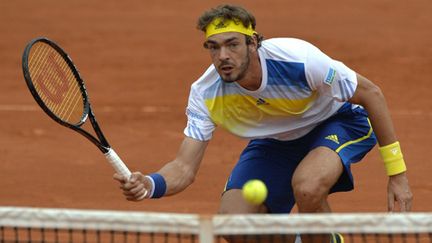 Guillaume Rufin sur la terre battue de Roland-Garros (MIGUEL MEDINA / AFP)