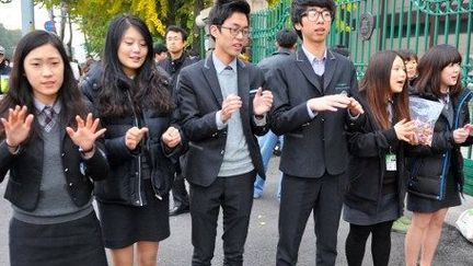 Le 8 novembre 2012, date des examens nationaux d'entrée aux universités, les entrainements militaires ont été suspendus et les vols commerciaux reprogrammés alors que 668.500 étudiants noircissaient leurs copies. (AFP PHOTO / KIM JAE-HWAN)