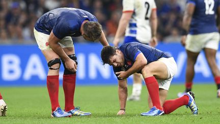 Antoine Dupont au sol lors du match entre la France et la Namibie, le 21 septembre 2023. (AFP)