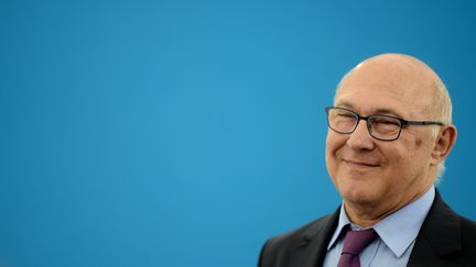 Le ministre des Finances Michel Sapin lors d'une visite d'usine, le 27 juin 2014 &agrave; Gasny (Eure).&nbsp; (DOMINIQUE FAGET / AFP)