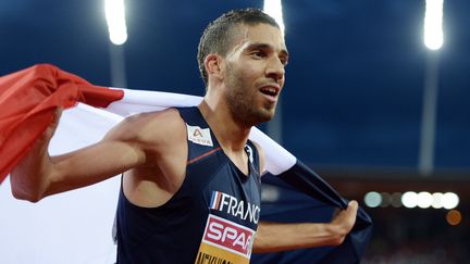 Mahiedine Mekhissi apr&egrave;s sa victoire et&nbsp;avant sa disqualification&nbsp;sur le 3 000 m steeple &agrave; Zurich (Suisse) lors des championnats d'Europe, le 14 ao&ucirc;t 2014. (PHILIPPE MILLEREAU / DPPI MEDIA / AFP)