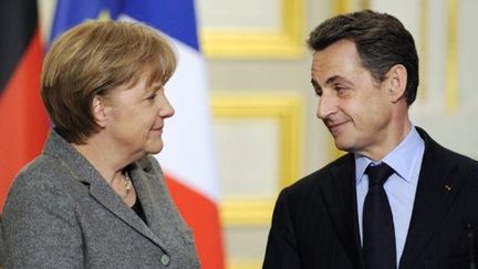 Nicolas Sarkozy et Angela Merkel ont affiché leur complicité lors de leur conférence de presse à L'Elysée le 6 février. (AFP)