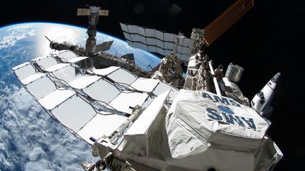 La Station spatiale internationale avec la navette Atlantis et un Soyouz russe, le 12 juillet 2011. (NASA / AFP)